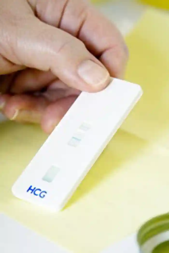 Photo showing a urine sample that has tested positive for human chorionic gonadotropin (hCG). This hormone is secreted by the <a  tabindex='0' class='popover-dismiss' href='/glands/placenta/' data-target-type='infoSheet' data-target-url='/glands/placenta/' data-bs-toggle='popover' data-bs-trigger='focus' title='placenta' data-bs-content='1451' >placenta</a> in pregnant women.